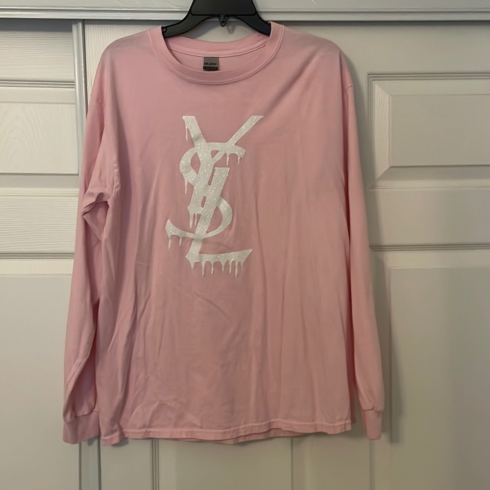 Long sleeve pink graphic t shirt.